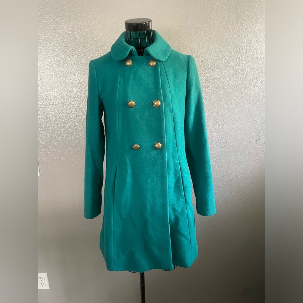 Beautiful vintage style wool coat with brass buttons.